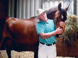 Top Purebred Arabian Fryvolous with trainer Rod Simpson at his barn at Lambourn in England. The 2009 Dubai Kahayla Classic winner lines up to contest today's Shadwell Dubai International Stakes (Group 1) at Newbury.