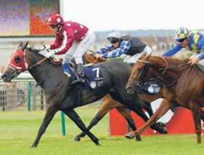 Jockey Arnaud Bouleau guides Raqiyah to victory in the race for Purebred Arabians held in Chantilly on Sunday. 